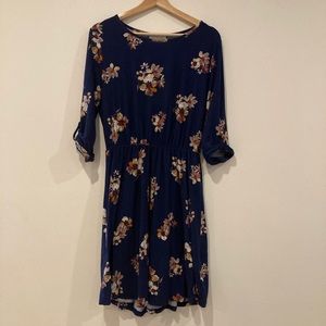Floral 3/4 length sleeve navy dress.